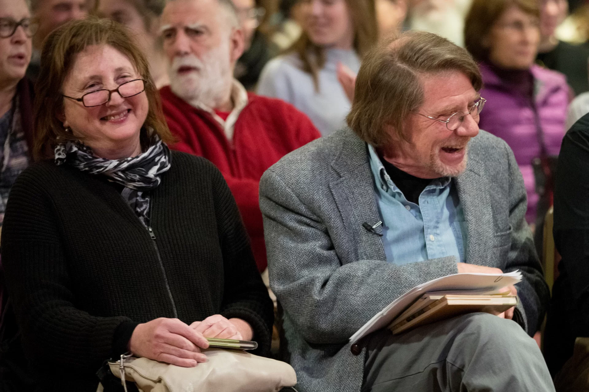Acclaimed poet and senior lecturer in English Robert Farnsworth signs a copy of his book "Honest Water" (Wesleyan) at the Muskie Archives tonight, where he read from his works for a special SRO "Literary Arts Live" event.
.
Founder of Bates' Concentration in Creative Writing and the reading series "Literary Arts Live," Farnsworth has published three collections of poetry: "Three or Four Hills and A Cloud" (Wesleyan), "Honest Water" (Wesleyan) and most recently, "Rumored Islands" (Harbor Mountain Press). Farnsworth's poems appear widely in magazines across North America and the UK, including the Hudson Review, The Southern Review, Michigan Quarterly, Ploughshares, Tri-Quarterly, The American Poetry Review, Beloit Poetry Journal, and elsewhere. Farnsworth has taught poetry writing and literature across the United States, and for the past twenty-six years at Bates College.
.
The special celebratory reading was in anticipation of his retirement at the end of this academic year.