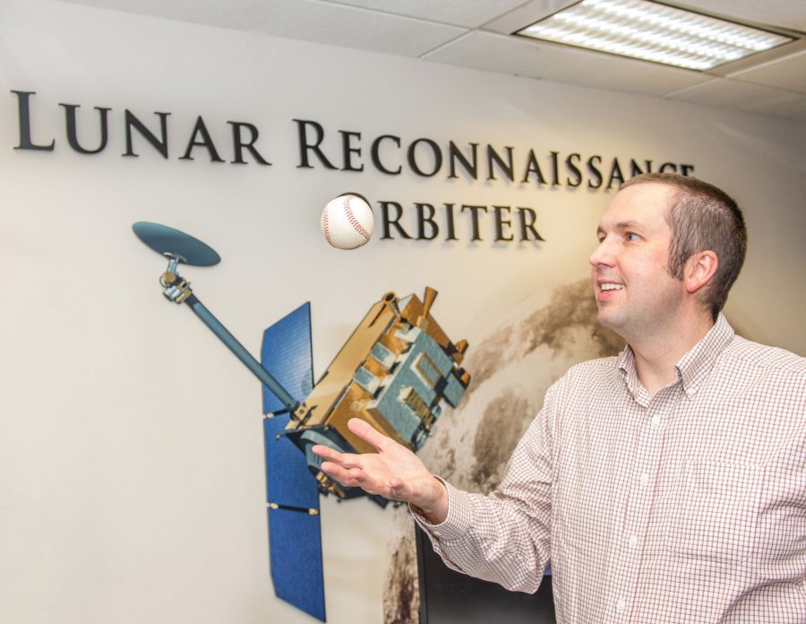 Scientist Noah Petro '17 represented NASA at a minor league baseball game in Oregon last August that had an "eclipse delay" because of the total eclipse of the sun. (Photograph courtesy NASA/W. Hrybyk)