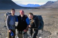 Professor of Geology Mike Retelle poses with Allie Balter '14 and Greg de Wet '11 at a field site in Svalbard, Norway, in 2013. Balter, now a graduate student at the University of Maine, conducted research in Antarctica in recent months. (Courtesy of Greg de Wet)