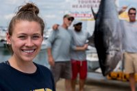 Biology major Michaela Pinette '19 of Cape Elizabeth, Maine, participates in her Gulf of Maine Research Institute internship, sponsored by Purposeful Work, under the guidance of University of Maine faculty member Walter Golet. She is spending the summer helping researchers learn more about the migratory patterns of Atlantic bluefin tuna.

Working alongside her and Golet is summer intern Drew Shane, a member of the University of Southern Maine Class of 2019.

They awaited fisherman to arrive at the dock  
at Port Harbor Marine
1 Spring Point Dr
South Portland, ME 04106

to take tissue samples from tuna heads during the annual Sturdivant Island Tuna Tournament.