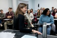 Elizabeth Rush speaks with students in Associate Professor of Geology Beverly Johnson's course on global change, including the impact of greenhouse gases on global climate, sea level, and ocean acidification. (Phyllis Graber Jensen/Bates College)