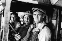 From left, Dorris Bowdon, Jane Darwell and Henry Fonda are shown in a scene from John Ford's "The Grapes of Wrath" (1940). (Courtesy of 20th Century Fox)