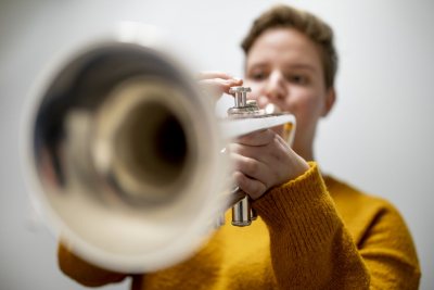 Julia Jesurum ’22 of Weston, Mass., practices the trumpet following a jazz band rehearsal in the Olin Arts Center Concert Hall. "I love improving myself on the trumpet, trying to get my best tone,” says Jesurum, who’s been playing since the fourth grade (Phyllis Graber Jensen/Bates College)