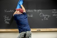 A day in the life of Pettengill Hall, featuring staff, faculty and students engaged in learning, studying, and working, with both internal and external images.

Custodian Randy Maxwell begins his shift on the ground floor of Pettengill, including departmental lounges, classrooms, the Atrium, vacuuming and washing blackboards.