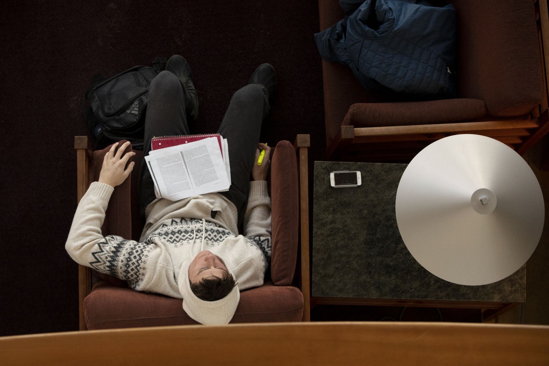 A day in the life of Pettengill Hall, featuring staff, faculty and students engaged in learning, studying, and working, with both internal and external images.

This student, dosing and studying in the Perry Atrium, said he was preparing for a class on PLTC 125/ "States and Markets" taught by Jason Scheideman, Assistant Dean of the Faculty for Budget and Administration and Lecturer in Politics. He told me his name was Peter Corey '22 although I cannot find him in the Bates directory.