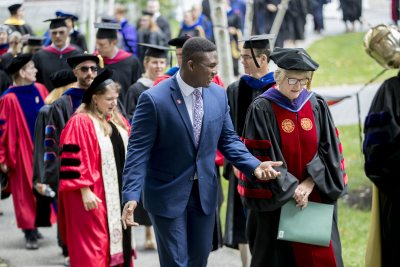 Convocation, held at 11 a.m. today on the Historic Quad, “provided Bates with an opportunity to welcome the Class of 2022, to celebrate the opening of the college, and to consider, as a community, our shared goals and hopes for the academic year,” said President Clayton Spencer..Led by the College Mace Bearer Michael Murray, Phillips Processor of Economics, the Convocation procession included President Spencer, Student Body President Walter Washington '19 of Fleetwood, N.Y., and Associate Professor of History Joe Hall..According to Spencer, “the College has resuscitated what was once a Convocation tradition at Bates: asking the outgoing senior class to select a faculty speaker for the incoming freshman class.” In this case, the Class of 2018 chose Hall to address the Class of 2022 -- and the entire Bates community. His talk was titled, “Questions for Bates.”.Immediately following Convocation, members of the Bates community attended a brief tree-planting ceremony, on the Quad behind Carnegie Science, held in memory of those in the Bates community who died during the past year. The ceremony was followed by a lunch will be served on the Library Quad for the college community.