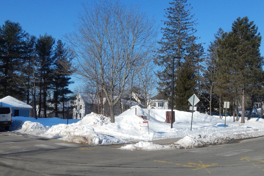 And here's where it all began: the future Bonney Center site, seen from a point in front of Chase Hall, in early March 2019 — just prior to the start of construction.  (Doug Hubley/Bates College)