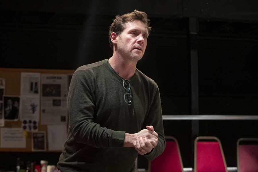 Play director and Assistant Professor of Theater Tim Dugan addresses his actors at the end of the cast's final dress rehearsal. (Phyllis Graber Jensen/Bates College)