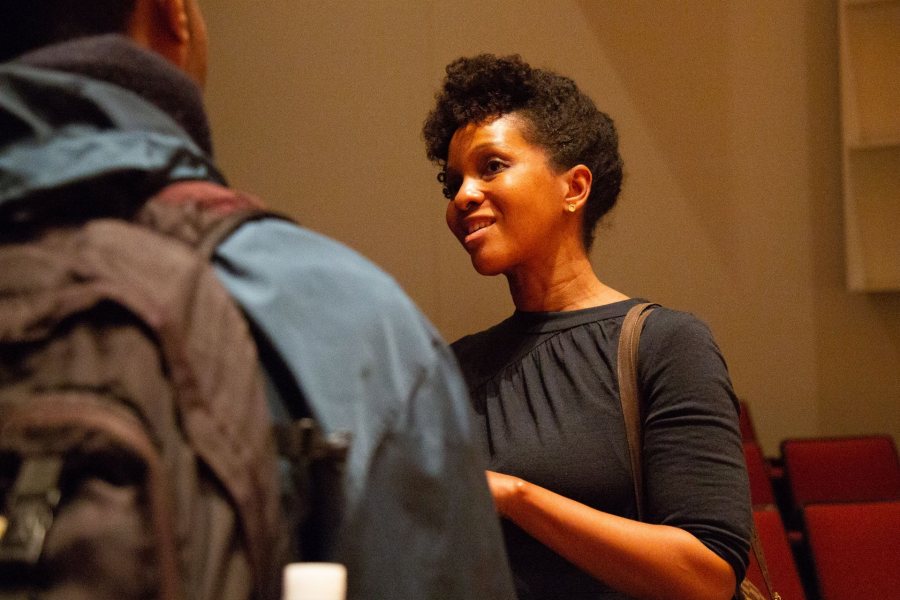 Imani Perry speaks with a student at her talk on March 7. (Samuel Mironko ’21/Bates College)