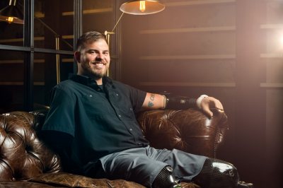 Travis Mills, a Maine resident and Army veteran who became a quadruple amputee in combat and is now an advocate for combat-injured veterans, will receive an honorary Doctor of Humane Letters degree. (Photograph by Sean Berry)