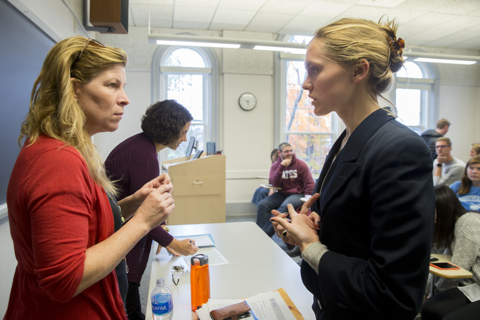 Historically in October, political campaigns have had to deal with the "October Surprise," says Associate Professor of Rhetoric Stephanie Kelly-Romano. Today, in her course, "Presidential Campaign Rhetoric," fictional Republican and Democratic candidates, their campaign staffs, and the press, had to cope with a mock national healthcare crisis in the United States.. In the college's Digital Media Studios, Molly Chisholm '17, playing a fictional Republican Governor of Massachusetts, and her opponent Gabriel Nott '17, playing a fictional Democratic Governor of Maryland, address the nation. Matt Baker '17 plays a fictional Republican U.S. Senator from Virginia, and Courtney Foster '18, a fictional Democratic U.S. Senator from Ohio. Their staffs include campaign directors and social media coordinators. The event was part of the semester-long 2016 Mock Campaign held by students in Associate Professor of Rhetoric Stephanie Kelley-Romano's Presidential Campaign Rhetoric course. The candidates and their staffs attended a class, BIMA 255A - Mathematical Models in Biology, taught by Associate Professor of Mathematics Meredith Greer, to consult with students about the epidemiology of smallpox.