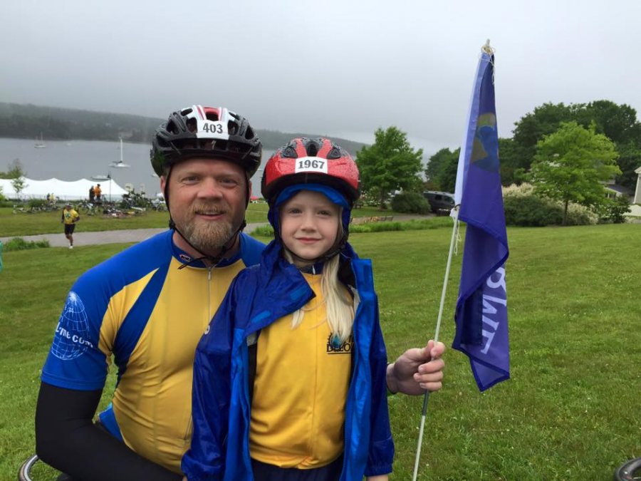 Chip Noble ’97 and his daughter Abby, now 10, rode the Trek Across Maine together in XXX. This year, his other daughter, 7-year-old Emma, is old enough to ride the Trek with them. (Courtesy of Chip Noble) 