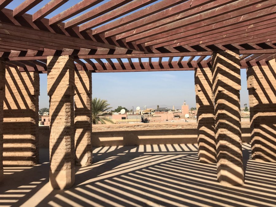 Rintell, Sophie Hamitlton Madrid Fall 2017 Hot afternoon sun casting shadows over sandy stones. Captured at the top of the wall enclosing ruins of the El Badi Palace in Marrakech, Morocco. This photo was selected for the 2019 Barlow Off-Campus Photography Exhibition and shown at the 2019 Mount David Summit on March 29, 2019.