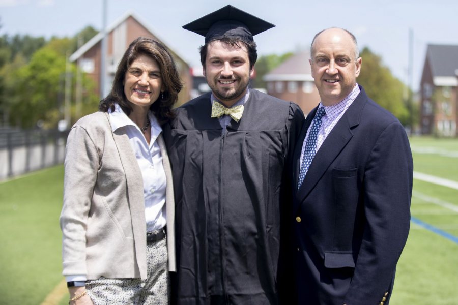 Posing on May 25, the day before Commencement, are Gordon Platt '19 and his parents, Julie Sutherland Platt '88 and Halsey Platt '88. (Phyllis Graber Jensen/Bates College)