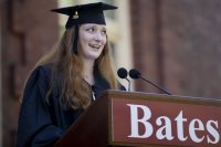 Bates College 2019 Commencement  (the one hundred and fifty-third) on the Historic Quad, at which Travis Mills receives an Doctor of Humane Letter. Placing the collar on Mills is the college's mace bearer, Charles Franklin Phillips Professor of EconomicsMichael Murray.