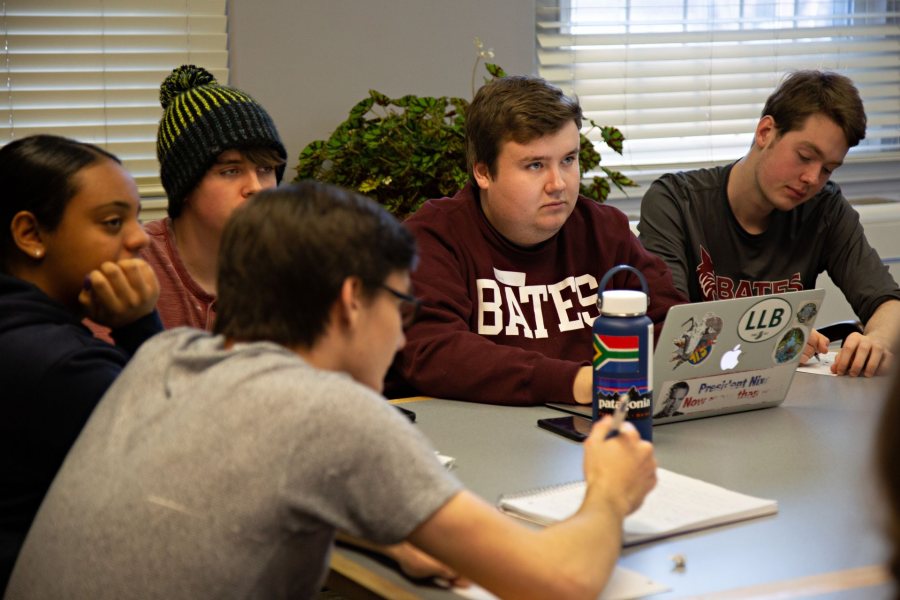 In January, Harry Meadows '19 (second from right) was part of a workshop that Bates debaters held for visiting high school students from Boston. (Grace Link ’19/Bates College)