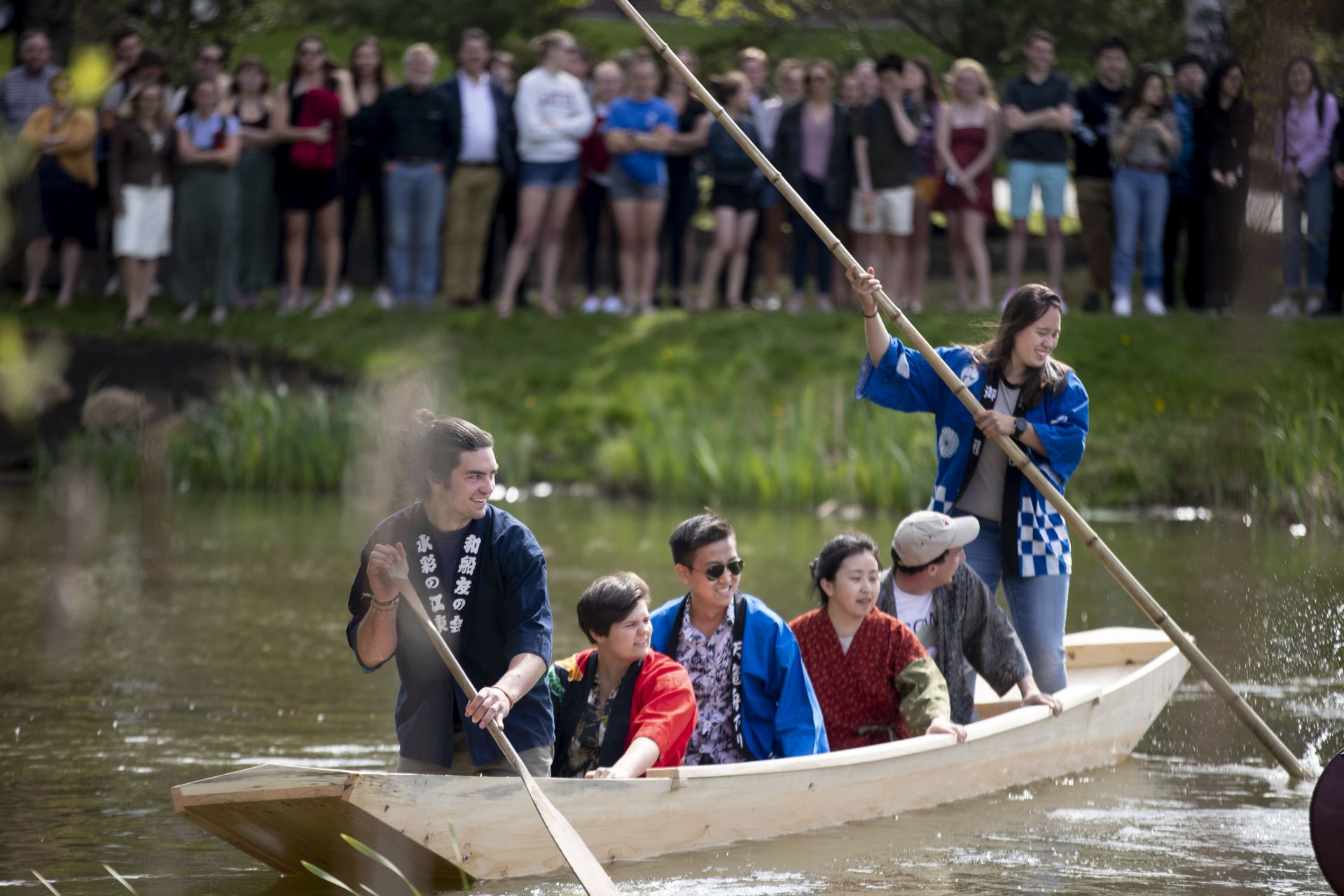 Students in Douglas Brook’s practitioner-taught Short Term course, “Apprentice Learning: Building the Japanese Boat,” launched their boats in a traditional Japanese boat launching ceremony on the Puddle at 3:30 p.m., a prelude to The Annual Showcase Event for Short Term Redesigns and Practitioner Taught Courses held in the Perry Atrium of Pettengill Hall..