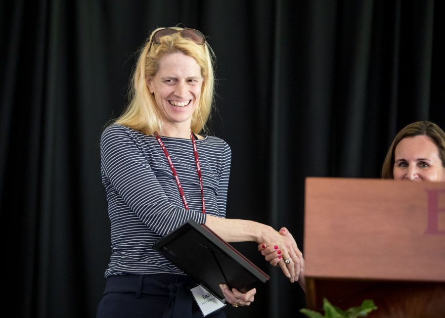 Emily Buchanan ’89 (left) receives the Sesquicentennial Prize from Jen Crawford '01, vice president of the Alumni Association. (Rene Roy for Bates College)