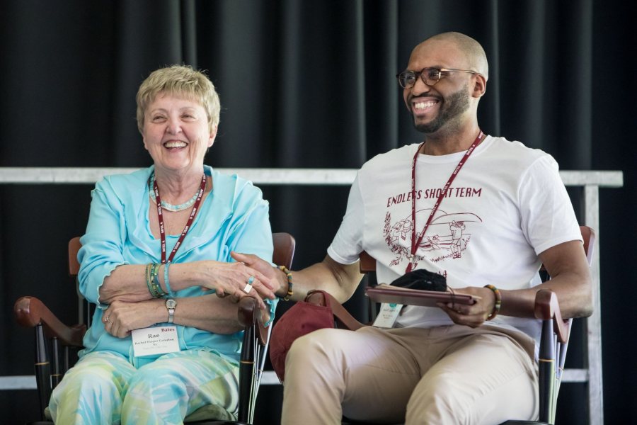 Rachel "Rae" Harper Garcelon '62, recipient of the Alumni Association's distinguished services award, congratulates David Longdon '14 after he received a Bates' Best award. (Rene Roy for Bates College)