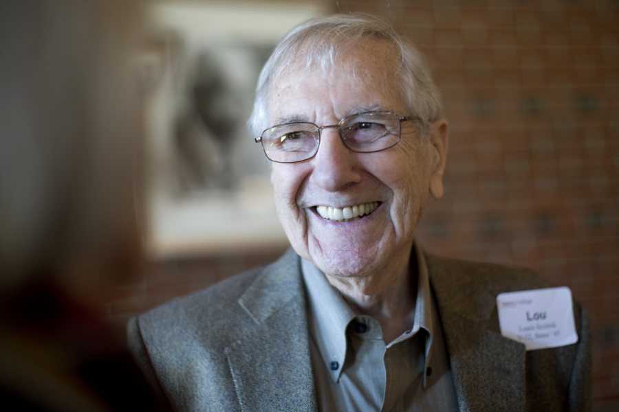 Louis Scolnik '45 is seen in 2013 at the annual luncheon for graduates of the Navy V-12 officer training program stationed at Bates during World War II.  (Phyllis Graber Jensen/Bates College)