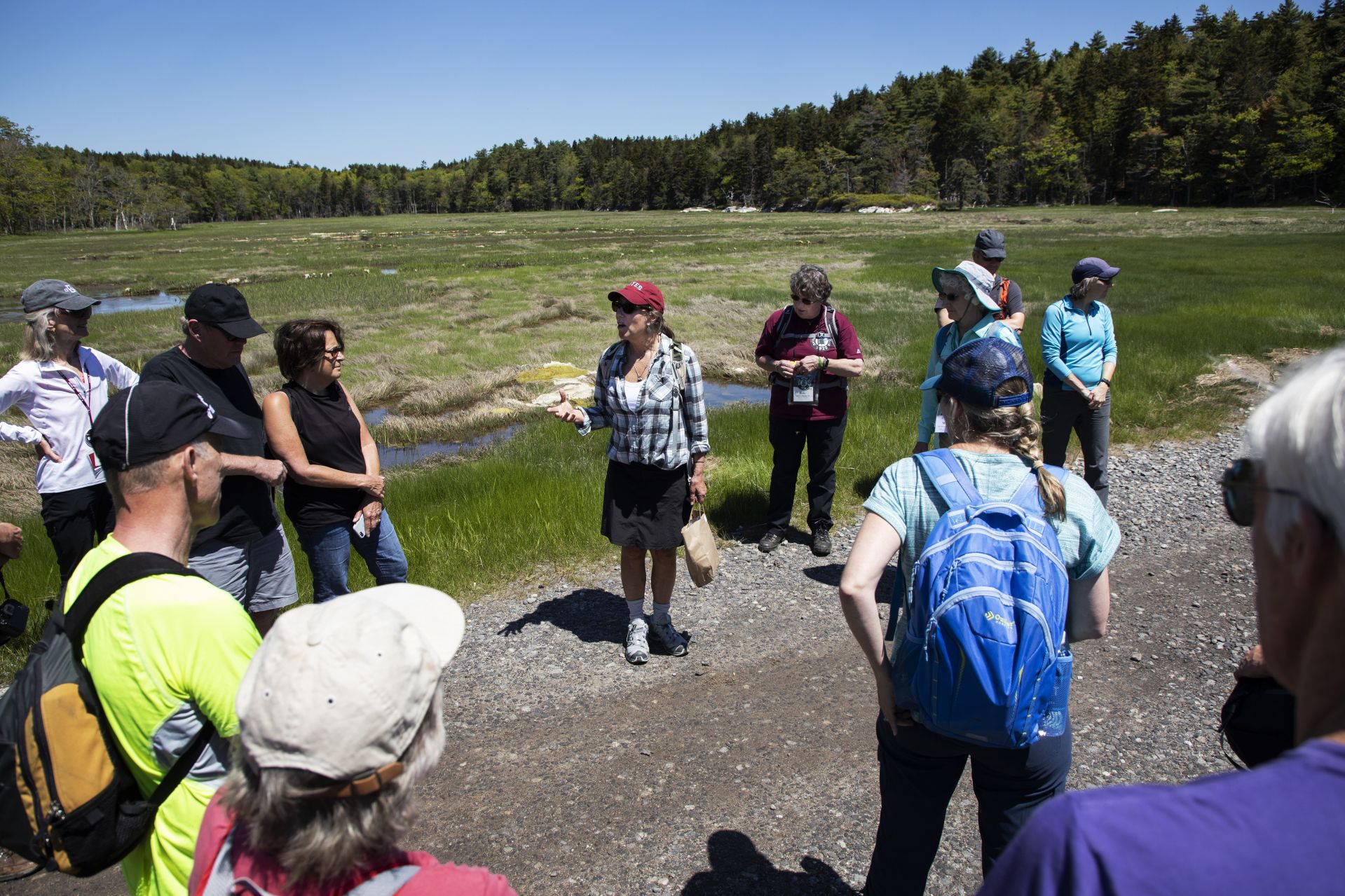 Moments from the Outing Club: Coastal Hike at Bates-Morse Mountain Conservation Area on June 7, 2019. Bates Conservation Area Director Laura Sewall and former director Judy Marden ’66 led a four-mile hike through the natural communities and varied terrains to Seawall Beach. Bates manages this resource for research and educational purposes and is conducting environmental research throughout the area.