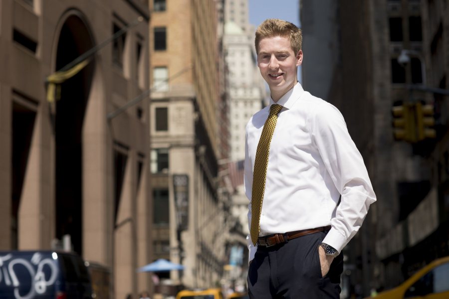 Keaton Shaw '21 ofMiddleton, Wis., a pre-med economics major, has a Purposeful Work Internship with SQN Capital Management, LLC100 Wall Street, 11th floor, New York City. He's working under the supervision of Andrew Carman '85. Shaw also posed outside of his office building on Wall Street, near the NY Stock Exchange, and next to a statue of George Washington in front of Federal Hall, the name given to the first of two historic buildings located at 26 Wall Street, New York City. The original, a Greek Revival structure completed in 1703, served as New York's first City Hall. It was the site where the colonial Stamp Act Congress met to draft its message to King George III claiming entitlement to the same rights as the residents of Britain and protesting "taxation without representation."