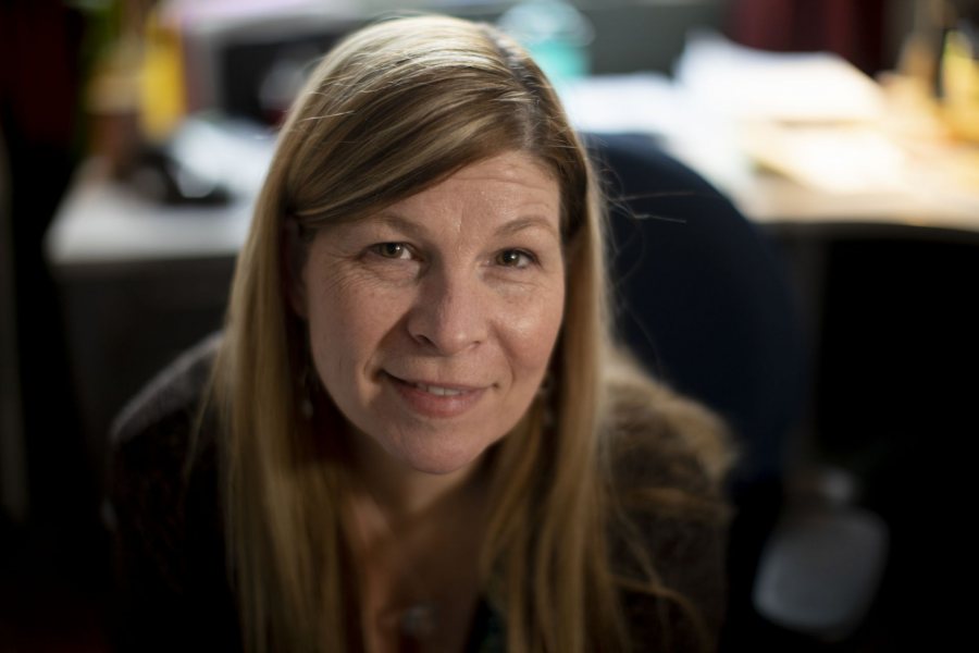 Associate Professor of Rhetoric, Film, and Screen Studies Stephanie Kelley-Romano in her Pettigrew Hall Office.