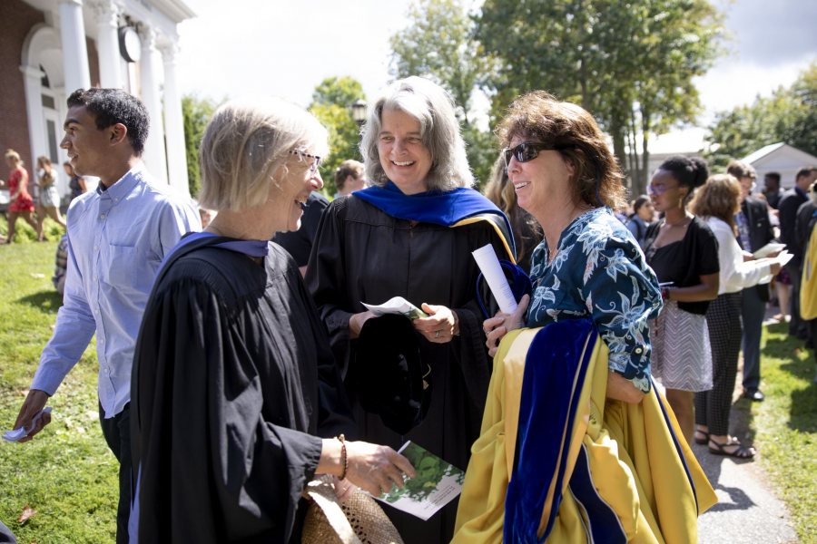 After Convocation, Costlow takes a moment to catch up with friends Beverly Johnson, professor of geology, and Lynne Lewis, Elmer W. Campbell Professor of Economics. (Phyllis Graber Jensen/Bates College)