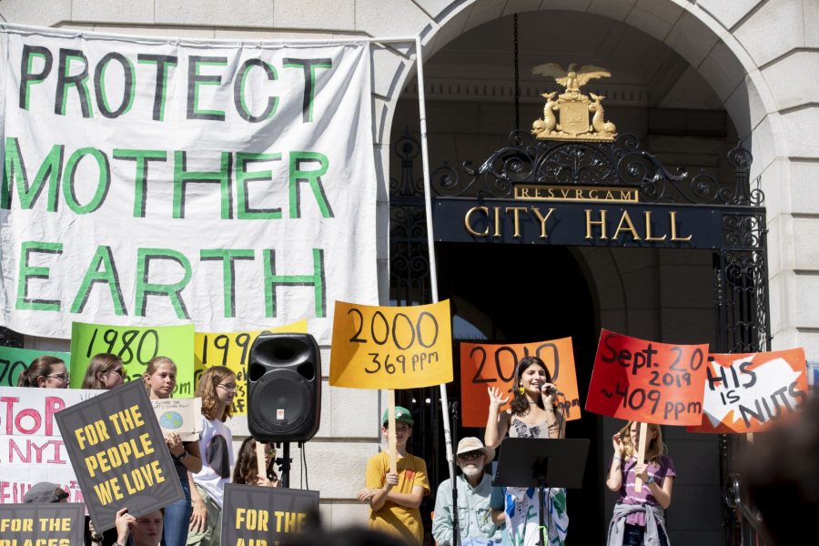 “I can't believe I'm even having to protest this.”.— Muskan Verma '21 of Shimla, India, shares the frustration of inaction on global climate change after she addressed a crowd of at least 2,000 at Portland City Hall gathered for the student-mobilized Global Climate Strike, ahead of the opening of the United Nations General Assembly and the Climate Action Summit on Sept. 23..“I'm not from this country,” she said. “But that shouldn't matter. This is affecting us all. And whether we like it or not, we have to take action.”.A representative of the Sunrise Movement, a youth-led movement for climate-change action, Verma is a double major in theater and in rhetoric, film, and screen studies. She joined a large contingent of Bates students and several faculty who attended the event, organized, in part, by the Bates Environmental Coalition..