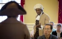 Stephen Sampson plays Prince Hall at a performance of Clifford Odle's <em>The Petition</em> at the Old State House in summer 2019. (Robin Lubbock/WBUR)