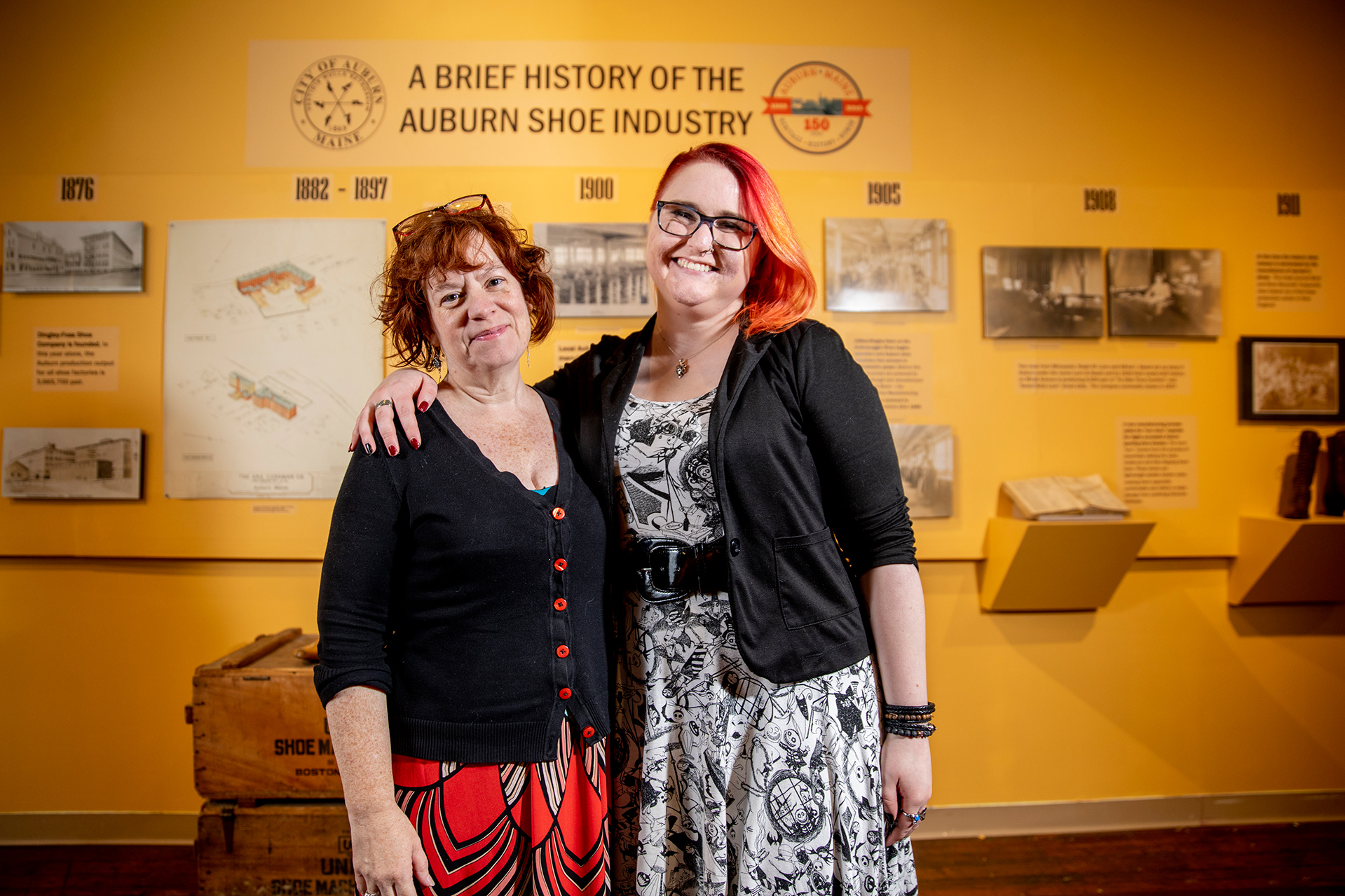 Associate Professor of Theater Christine McDowell, left, worked with Emma Sieh, Museum L-A collections and exhibits coordinator, to create the museum's shoe exhibition. (Phyllis Graber Jensen/Bates College)