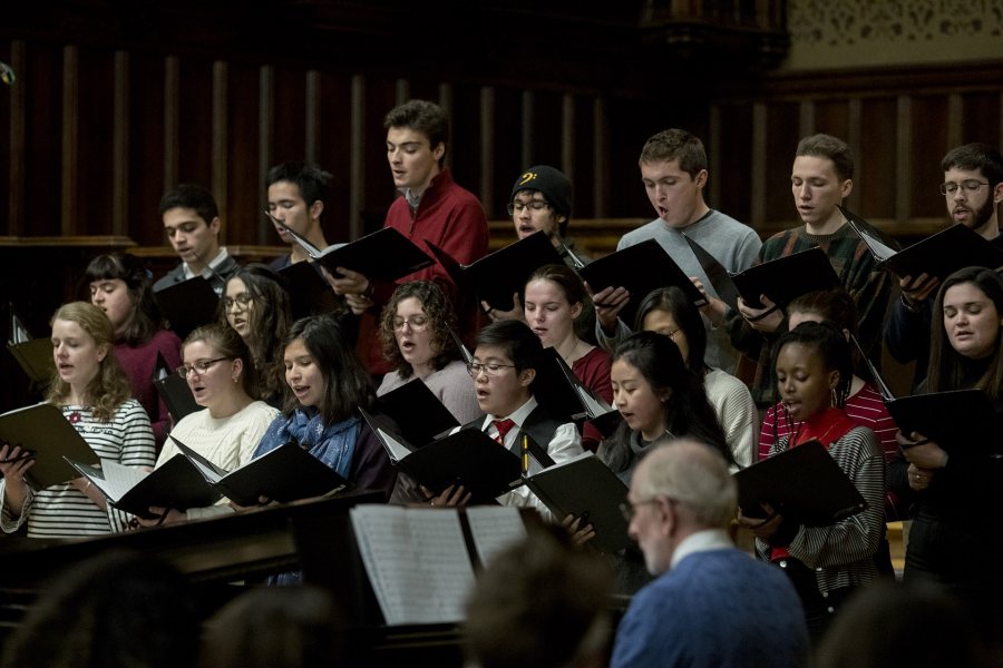 "Students gather this evening in the Peter J. Gomes Chapel for “Candles and Carols,” the annual candlelit service of communal singing, reflective readings from many traditions, and musical offerings by the Bates College Choir, Bates acapella groups, Mark Su’22, Amelia Keleher ‘21, and Music Director/Organist John Corrie. The evening was sponsored by the Bates College Multifaith Chaplaincy.