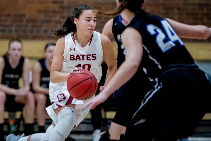 The Bates women's basketball team hosts four games in December, including a Dec. 7 context against St. Joseph's. Seen here against the University of New England last year is Melanie Binkhorst '20, who recorded 11 points, six rebounds, one assist and three steals in Bates' 86-85 on Nov. 25. (Phyllis Graber Jensen/Bates College)