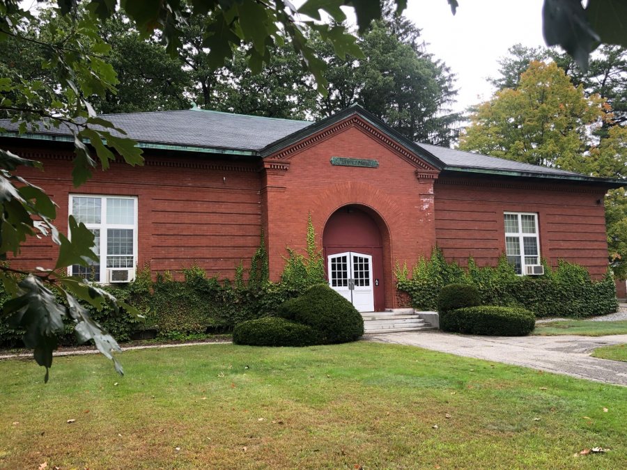 A distinctive Bates building, Libbey Forum features a Romanesque entrance and hipped roof. (H. Jay Burns/Bates College)