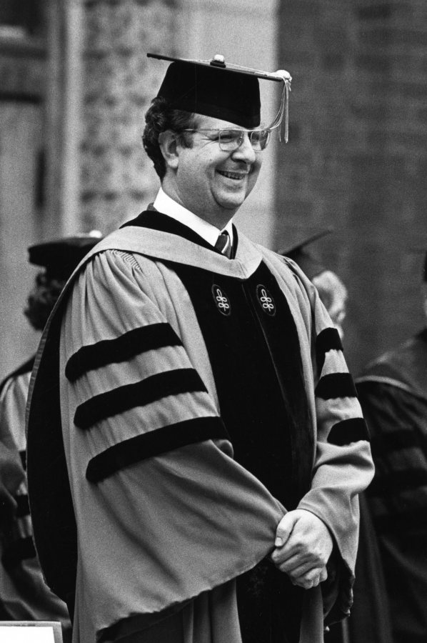 Carl Straub stands during the processional of Commencement in 1977. (Muskie Archives and Special Collections LIbrary)