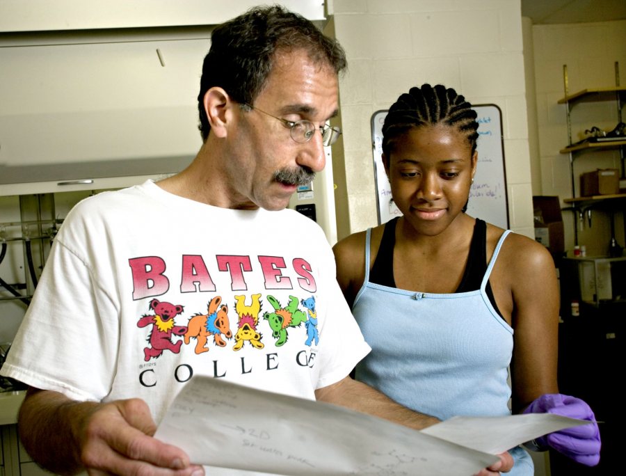 Focusing on the field of chirality, Dana Professor of Chemistry Tom Wenzel works with a group of student researchers in his Dana laboratory:Matt Chodomel '06 (working on the rotary evaporator: removes a solvent from a reaction)Catherine Dignam (sleeveless blue oxford shirt), Camille and Henry Dreyfus Foundation fellowMonique Brown '07 (garnet t-shirt)Ann Lovely '07 (bun, yellow shorts, light blue t-shirt)Lily Conover '07 (sleeveless white t-shirt)Shawna-Kaye Lester '08 (blue tank top)