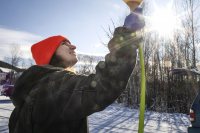 Madison "Maddie" Hallowell ’19 of North Haven, Maine, Interdisciplinary Studies,High Altitude Ballooning Club leader, fills a ballon with helium on November 9, 2019.