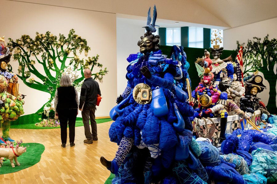 During a visit to Bates College, students from the Tripp Middle School in Turner stop for a tour of the Bates Museum of Art, where they view two exhibitions on display.Upstairs: "Vanessa German:Miracles and Glory Abound" (October 25, 2019 ñ March 28, 2020)Downstairs: "Ralph Eugene Meatyard:Stages for Being (October 25, 2019 ñ March 28, 2020)Louise Ouillette, Bates Museum of Art attendant, and Tony Leavitt, a science teacher at the Tripp Middle School, takes a closer look at Vanessa German's art work in the Upper Gallery of the Museum.