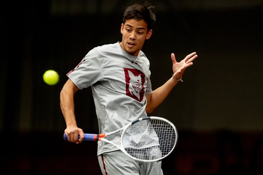 Jacob Kauppila plays against Wheaton in March 2019. (Phyllis Graber Jensen/Bates College)