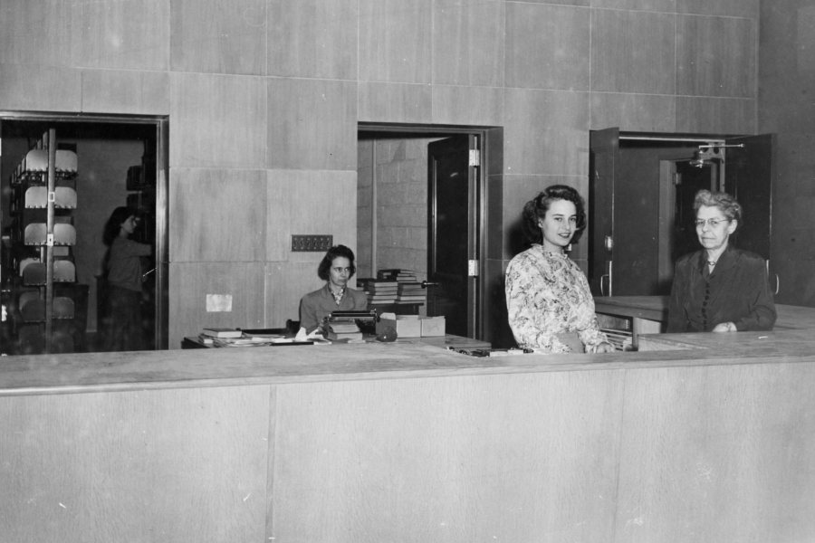 The staff of Coram Library in 1946, from left:, Elizabeth Stoneham, Assistant Librarian Iva Foster '30, student worker Jeannette Packard Stewart '46, and librarian Mabel Eaton, Class of 1910. (Muskie Archives and Special Collections Library)