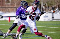 Jack Allard turns the corner for the score during Bates' game against Amherst on Feb. 28, 2015