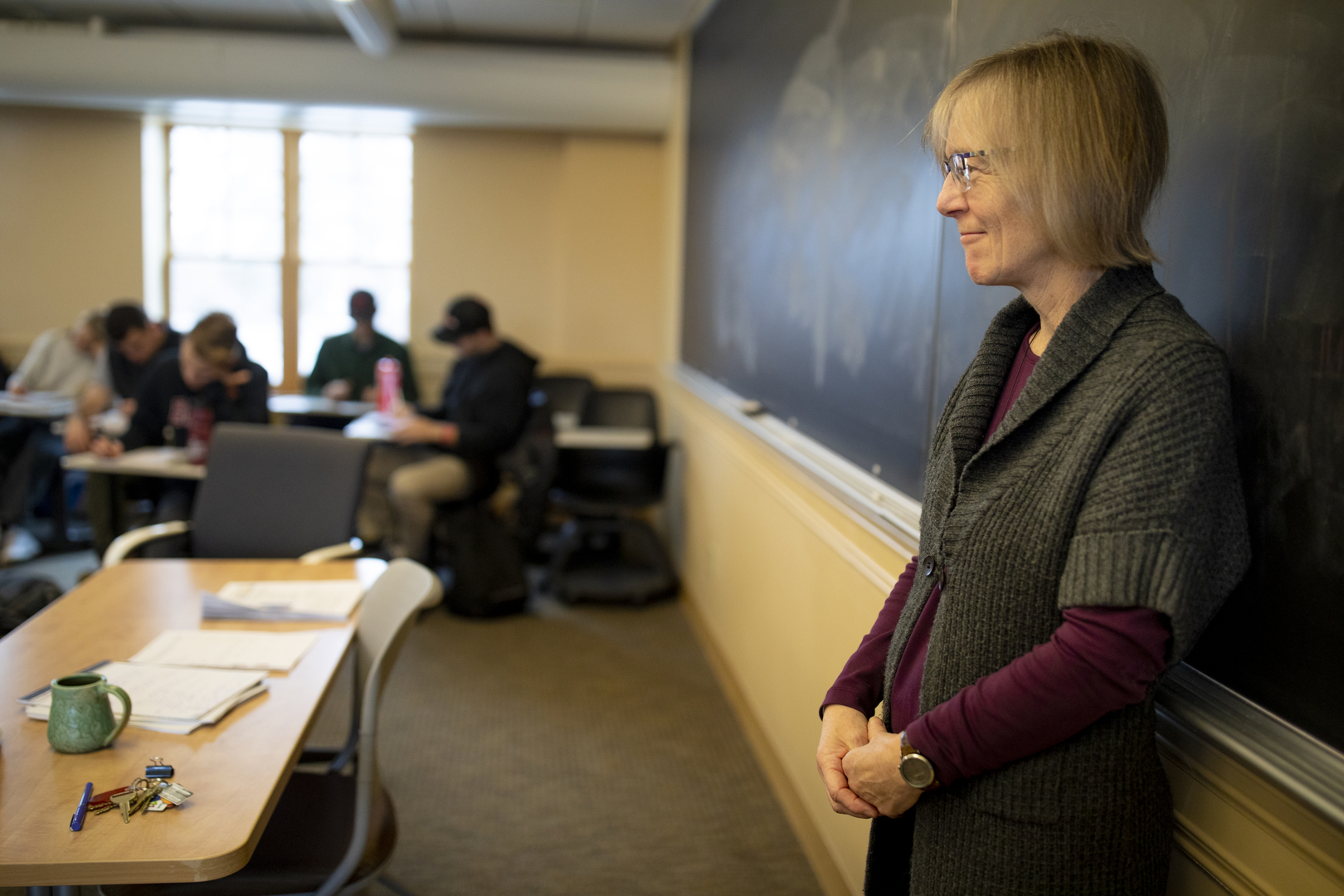 Costlow observes her "Catastrophes and Hope" students on the first day of the semester. (Phyllis Graber Jensen/Bates College)