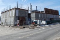 Structural steel and a few concrete wall forms are shown in this northeast view of the science center taken March 25, 2020. (Doug Hubley/Bates College)