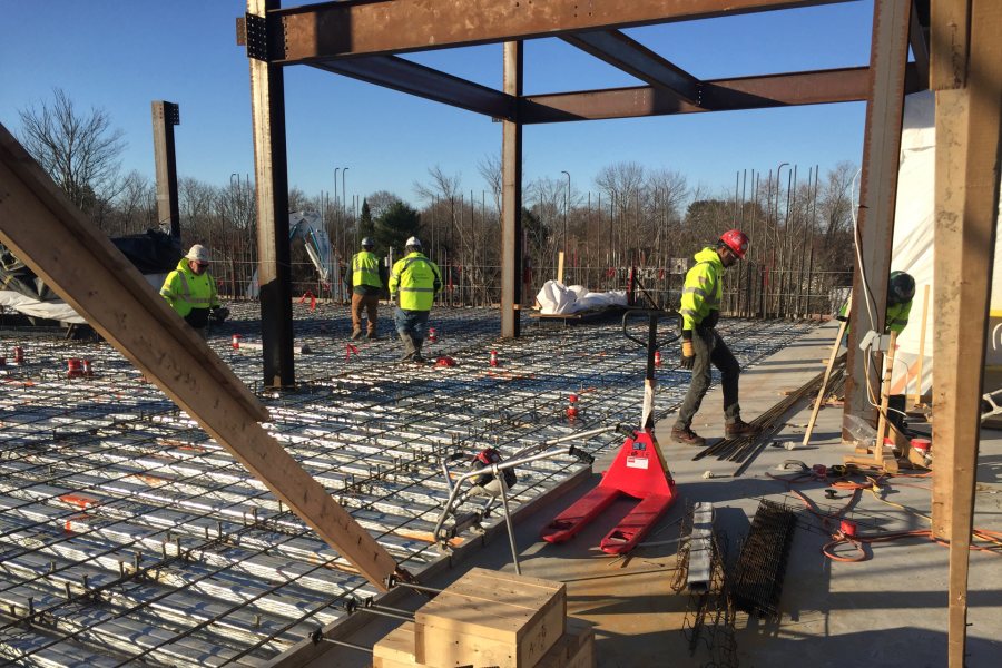 Final preparations are underway just before concrete flows to complete the third-story floor slab at the Bonney building. (Jacob Kendall/Bates College)