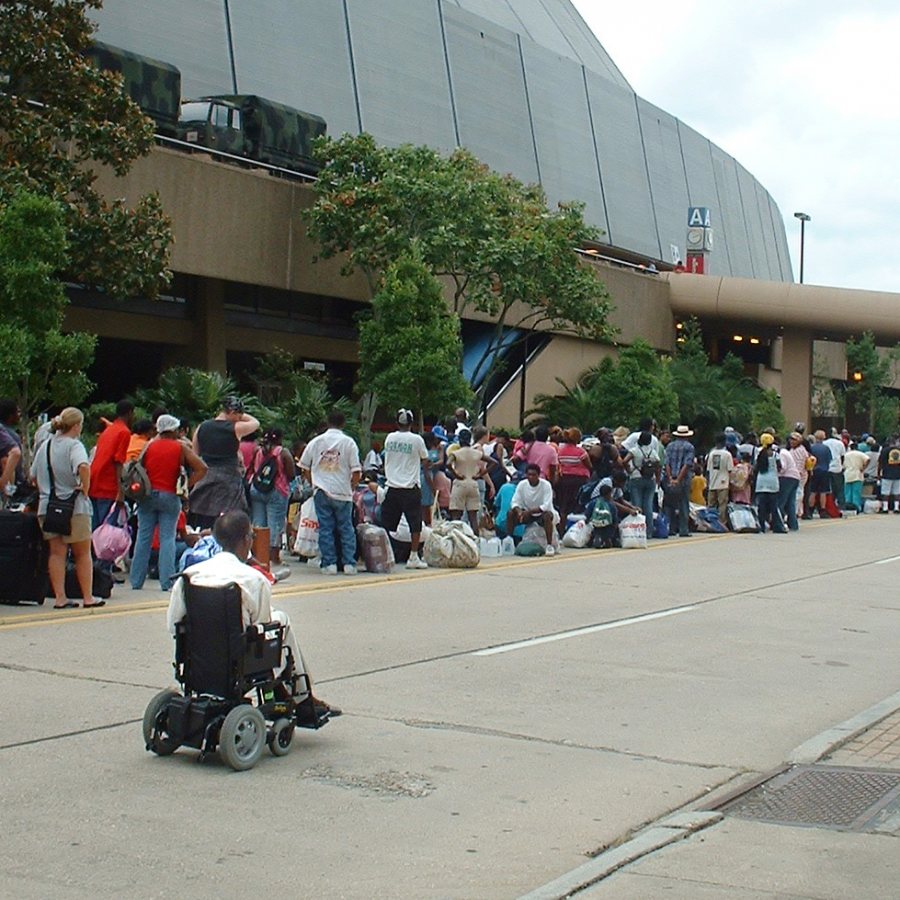 New Orleans, LA.  August 28, 2005 -- Residents are bringing their belongings and lining up to get into the Superdome which has been opened as a hurricane shelter in advance of hurricane Katrina.  Most residents have evacuated the city and those left behind do not have transportation or have special needs.  Marty Bahamonde/FEMA