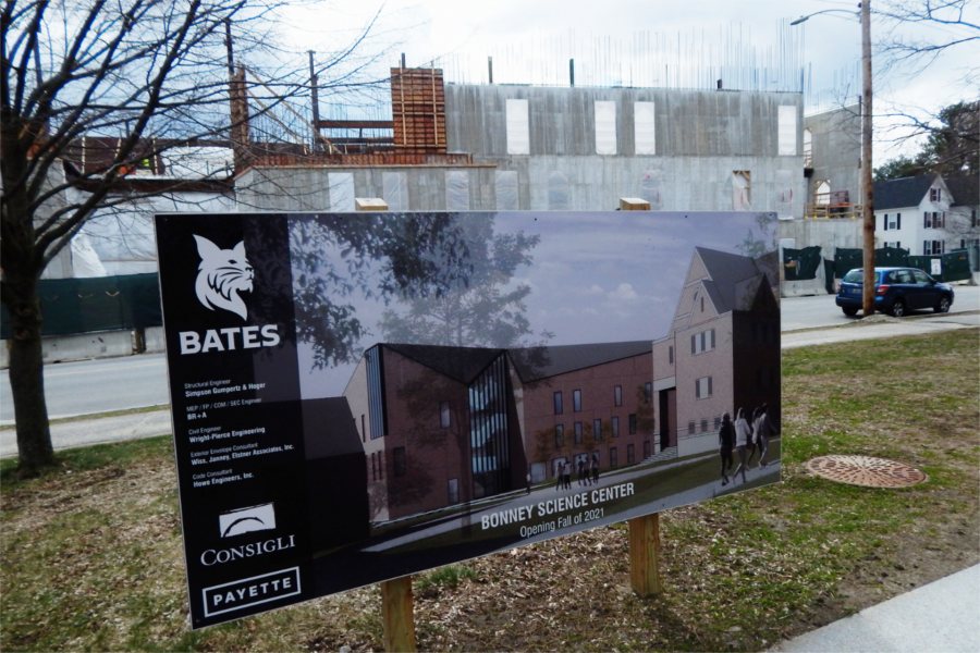 Shown on April 15, 2020, is an architect's rendering of the Bonney Science Center with the real item in the background. (Doug Hubley/Bates College)