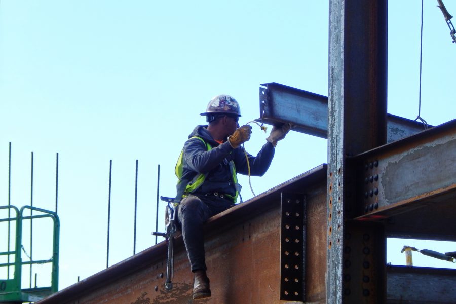 Receiving a girder that will support the penthouse floor of the Bonney Science Center. (Doug Hubley/Bates College)