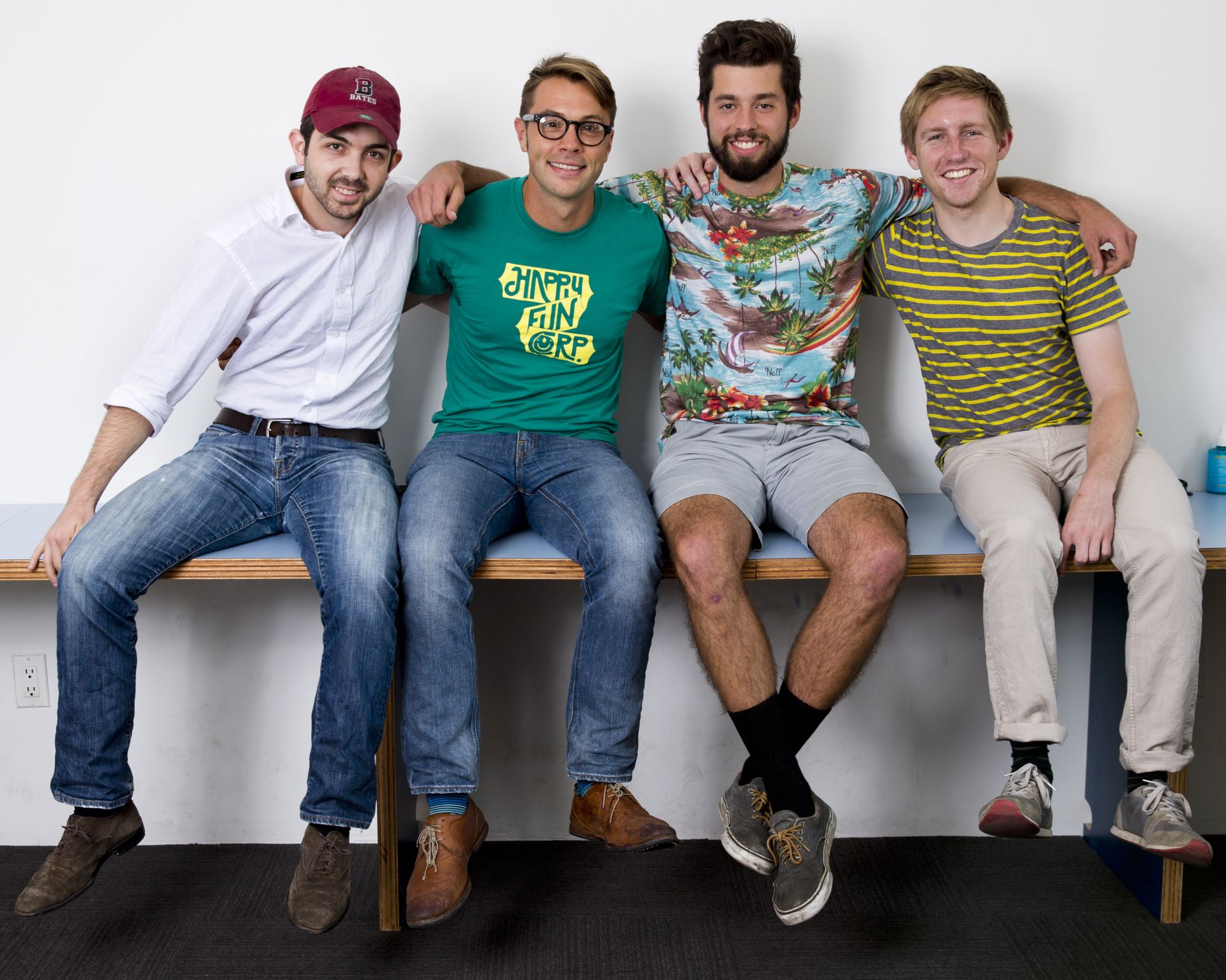 Ben Schippers '04, co-founder of the Brooklyn-based digital engineering firm HappyFunCorp (HFC) that he co-founded with colleague Will Schenk in 2009.
In photos, Schippers meets with staff, including project manager Ricky Weisskopf '98 in his DUMBO offices at 18 Bridge Street.
In a feature for Fast Company, Ben Schippers ’04 talks about his latest tech endeavor, and how leading a practitioner-taught Short Term course at Bates prepared him for the challenge. The room with white walls is the future site of the technology academy.
In the vast landscape of coding schools, what sets HFC Academy apart is Schippers’ emphasis on product management, with an eye to recruiting the most successful students to work at Happy Fun Corp.
HFC is a software engineering firm headquartered in Brooklyn, NY. it's happy family of 52 smart, talented, and yet humble engineers, designers and product architects. Engineering has been and always will be what drives everyone at HappyFunCorp.
They believe in holistically building cutting edge products for the web, mobile, and really anything on the internet.