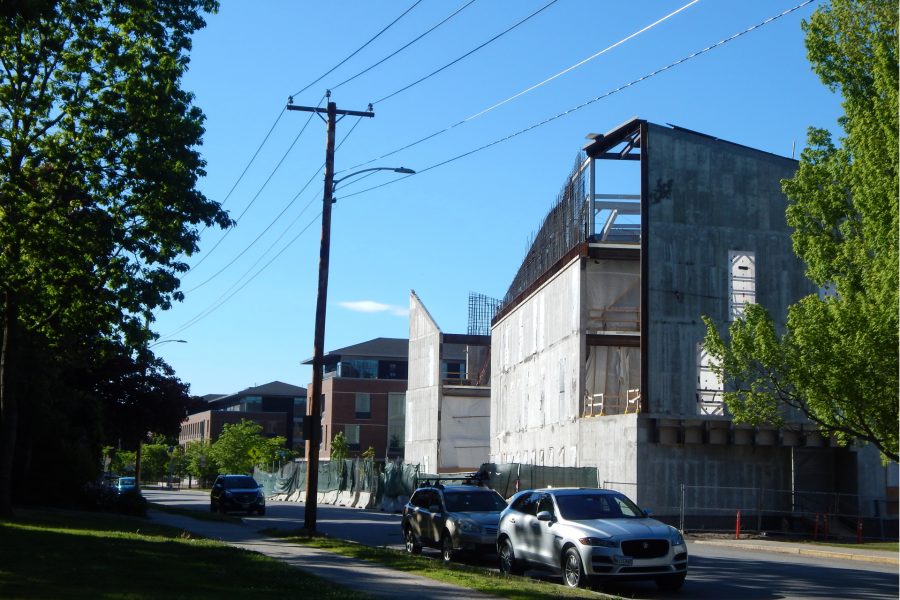 From right to left, the Bonney Science  Center, Chu Hall and Kalperis Hall are shown from the edge of the Historic Quad. (Doug Hubley/Bates College)