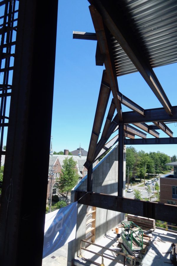 About two hours before the event, here's the location of the final beam for the Bonney Science Center, placed on June 16 at the topping-off celebration: The beam will slant from the flanges at top center to the junction of steel and concrete  toward the bottom. (Doug Hubley/Bates College)